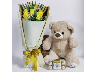 Sweet Comfort: Chocolate, Teddy, and Flower Combo from Sharjah Flower Delivery